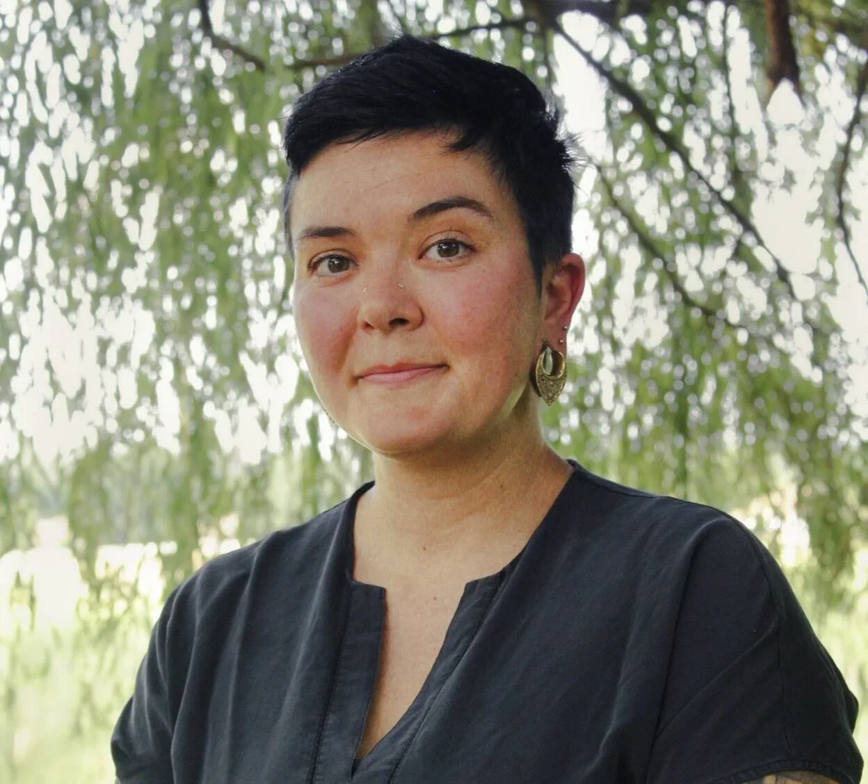 pregnancy, birth, postpartum doula Portrait of Olli, owner of Clover Blossom Doula Care LLC